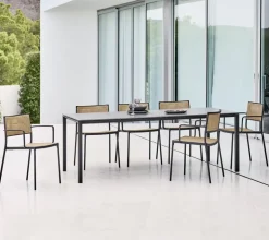 Cane-line Less armchair, stackble, grey - French weave natural