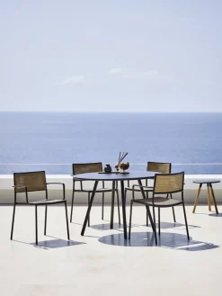 Cane-line Less armchair, stackble, grey - French weave natural