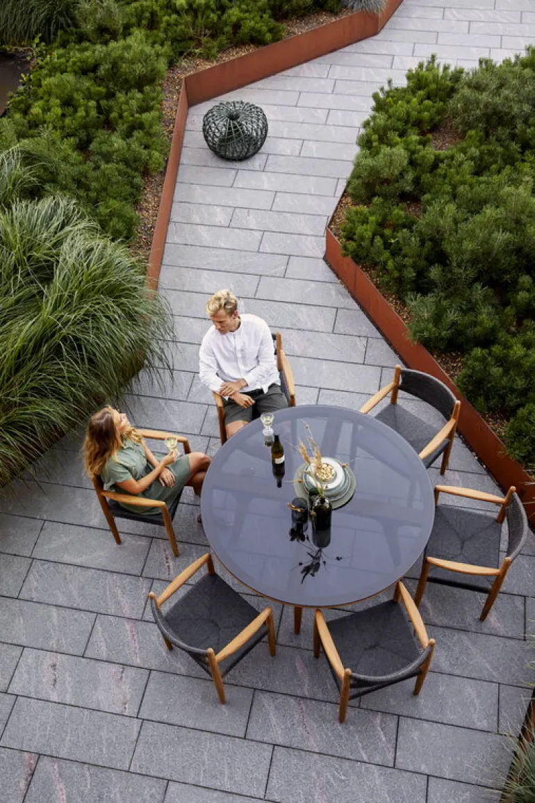 Cane-line Nest footstool, small, dark green