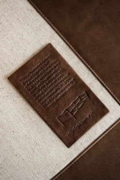 Fogia Tiki 2-seater sofa, anniversary edition, black steel - vintage tabacco