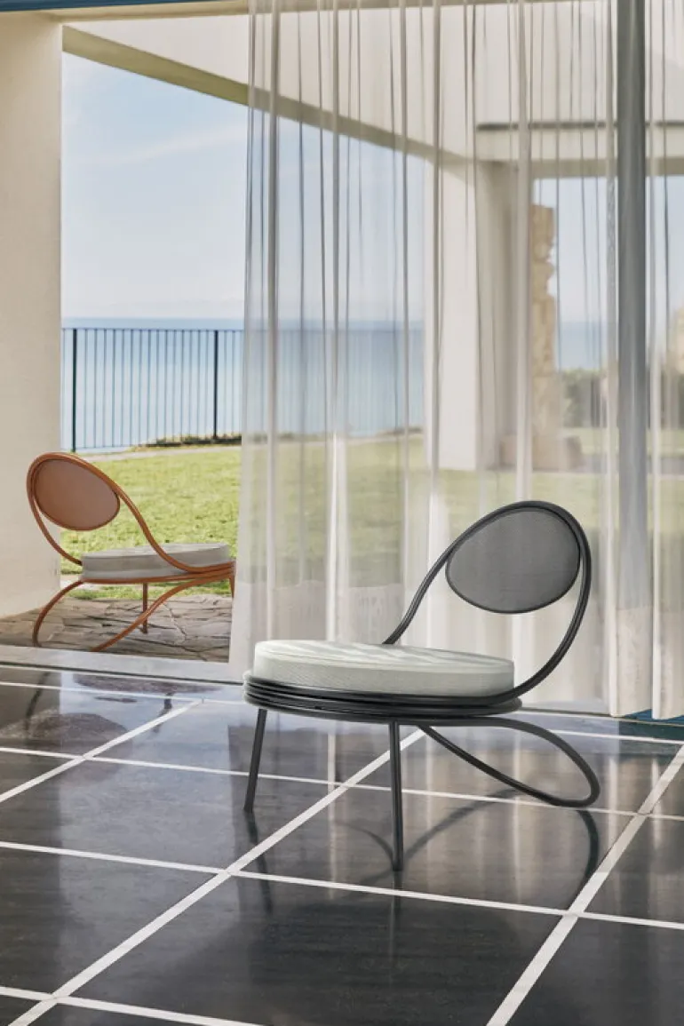 GUBI Copacabana lounge chair, orange - Limonta Leslie 40