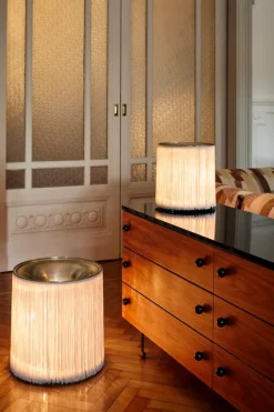 GUBI Model 597 table lamp, polished aluminium - cream fringe