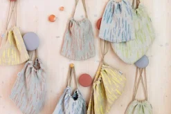 Lapuan Kankurit Osmankäämi ribbon bag, yellow - linen