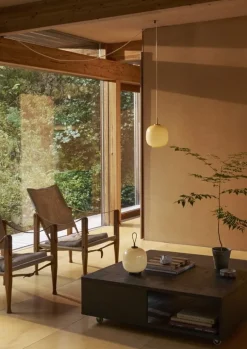 Louis Poulsen VL45 Radiohus portable lamp, brass - pale yellow