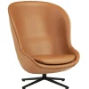 Normann Copenhagen Hyg lounge chair, high, swivel and tilt, black - brandy leather