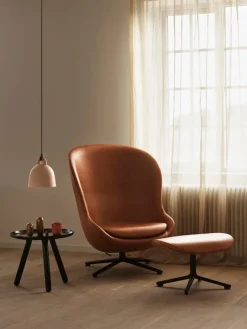 Normann Copenhagen Hyg lounge chair, high, swivel and tilt, black - brandy leather