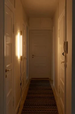 NUAD Radent wall lamp 70 cm, brass