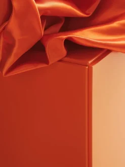 String Furniture Relief chest of drawers with legs, low, orange