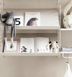 String Furniture String magazine shelf, beige