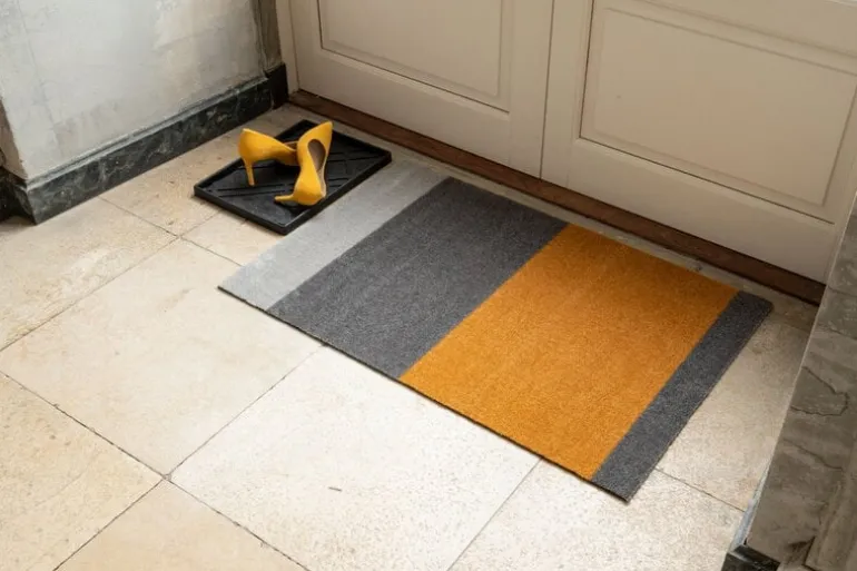 Tica Copenhagen Stripes horizontal floor mat, 60 x 90 cm, grey - muted yellow