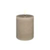 Uyuni Lighting LED pillar candle, 7,8 x 10 cm, rustic texture, sandstone