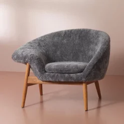 Warm Nordic Fried Egg lounge chair, Scandinavian Grey sheepskin