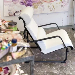 Yrjö Kukkapuro Remmi lounge chair, black - white leather